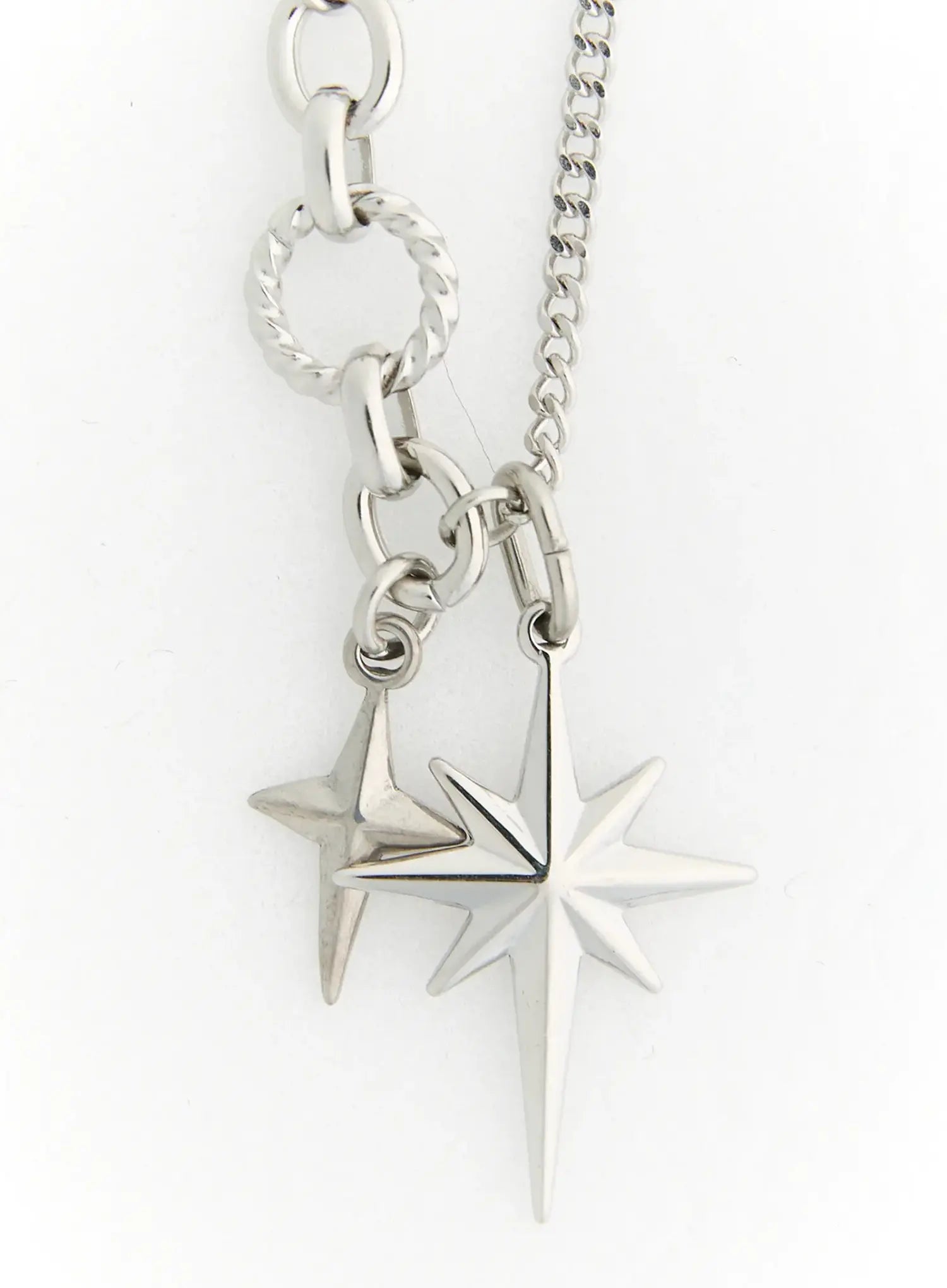 LEWKIN Orion Double Cross Necklace IL517 Silver close-up detail of dual north star charms on mixed curb and twisted ring chain against white background