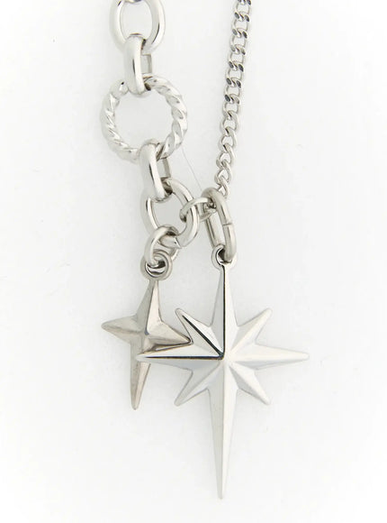 LEWKIN Orion Double Cross Necklace IL517 Silver close-up detail of dual north star charms on mixed curb and twisted ring chain against white background