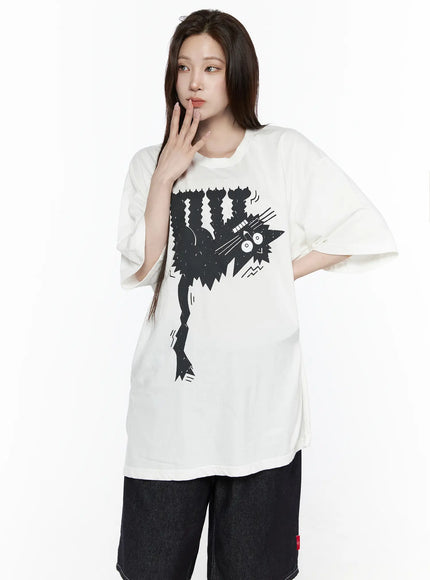 Oversized Kitty Graphic T-Shirt IL516 White front shot female model hand near face showing full graphic print oversized fit with side slit hem detail