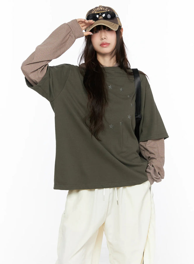 LEWKIN Oversized Layered Tee Striped Hoodie CL523 Dark green front model shot wearing cap and crossbody bag layered over brown striped hoodie with star print