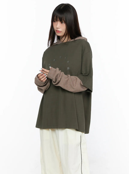 Oversized Layered Tee Striped Hoodie CL523 Dark green side model shot showing star print chest detail layered brown striped hoodie sleeve with relaxed boxy fit