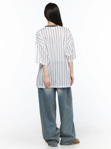 Oversized Mesh Jersey CL523 White back model shot revealing clean pinstripe mesh fabric, V-neck black stripe collar, dropped shoulders, wide-leg jeans