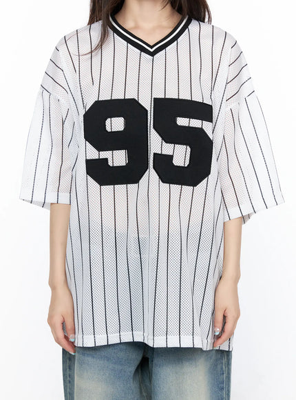 Oversized Mesh Jersey CL523 White close-up front model shot highlighting black 95 applique, V-neck with black-white stripe trim, pinstripe mesh fabric detail