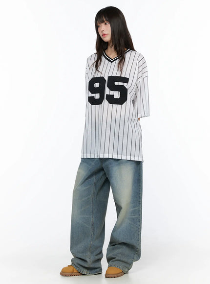 Oversized Mesh Jersey CL523 White full-body front model shot with 95 applique, pinstripe mesh fabric, paired with wide-leg jeans and tan chunky shoes