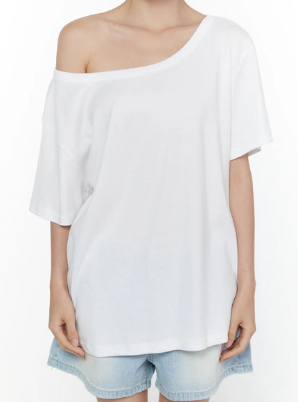 Oversized Off-Shoulder Tee CL520 White close-up detail shot on model highlighting wide off-shoulder neckline rib trim and relaxed oversized cotton fabric