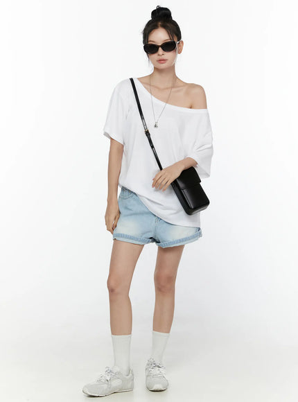 Oversized Off-Shoulder Tee CL520 White full-body front shot on model paired with denim shorts white sneakers and socks casual summer outfit