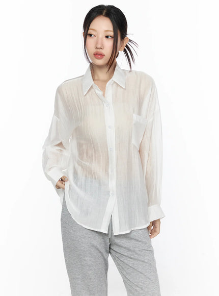 Oversized Sheer Shirt CL524 White front model shot, semi-transparent crinkle texture, point collar, chest pocket, paired with grey trousers