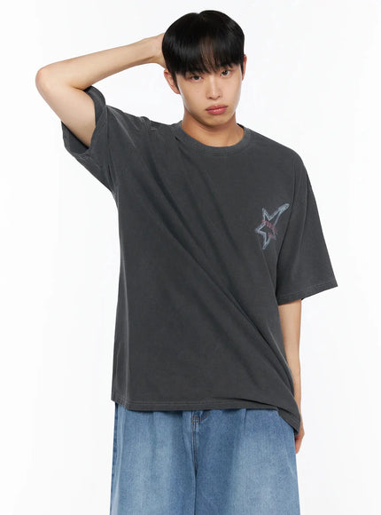 Oversized Star Graphic T-Shirt IL516 Charcoal front close-up on male model hand behind head showing small star chest graphic on washed cotton