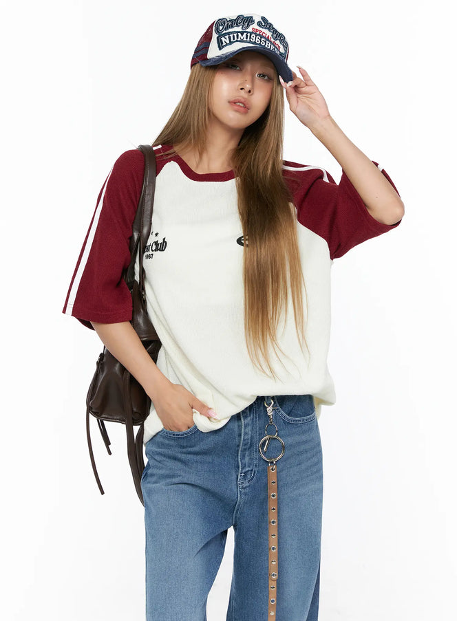 Oversized Waffle Knit Tee CU523 Dark red M/L front model shot styled with cap and backpack, ivory body with dark red raglan sleeves and white stripe detail