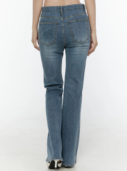 Paget Flared Bootcut Jeans IL506 Blue back view on model cropped showing dual back pockets faded wash center seam and flare shape