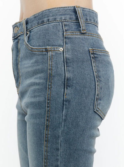 Paget Flared Bootcut Jeans IL506 Blue close-up detail of side back pocket amber topstitching rivet hardware and washed denim texture