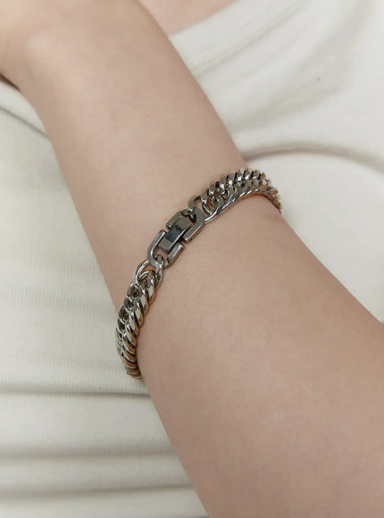 LEWKIN Parker 8mm Chain Bracelet IL522 silver close-up on model wrist showing box clasp detail against white ribbed fabric