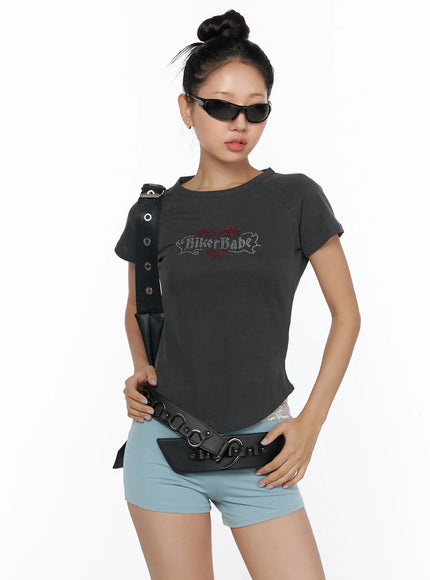 LEWKIN Pigment Cap Sleeve Tee CL510 Dark gray front model shot size S/M with rhinestone BikerBabe heart graphic styled with black crossbody bag and light blue mini shorts