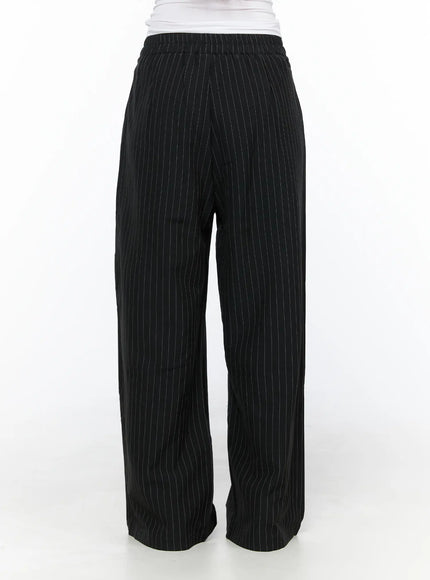 Pinstripe Wide Leg Trousers CL513 Black back shot on model showing elastic waistband clean back panel and wide-leg hem pooling at floor