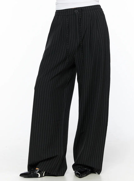 LEWKIN Pinstripe Wide Leg Trousers CL513 Black S front close-up on model showing button waistband and pinstripe wide-leg silhouette with patent loafers