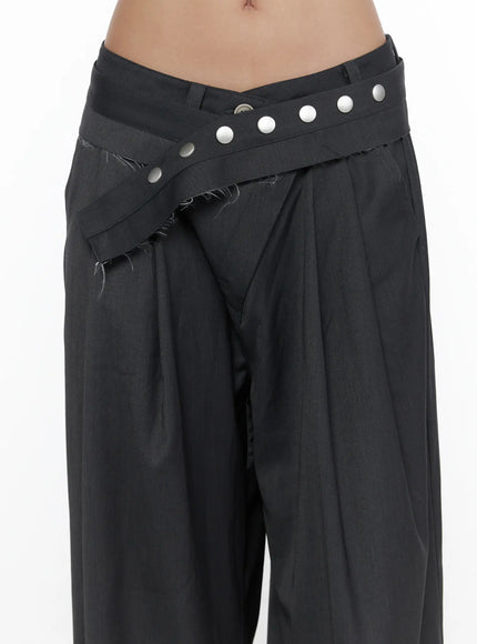 Pintuck Belted Wide Slacks CL510 dark gray waist close-up detail on model, silver stud belt strap, frayed fabric edge, pintuck pleats visible