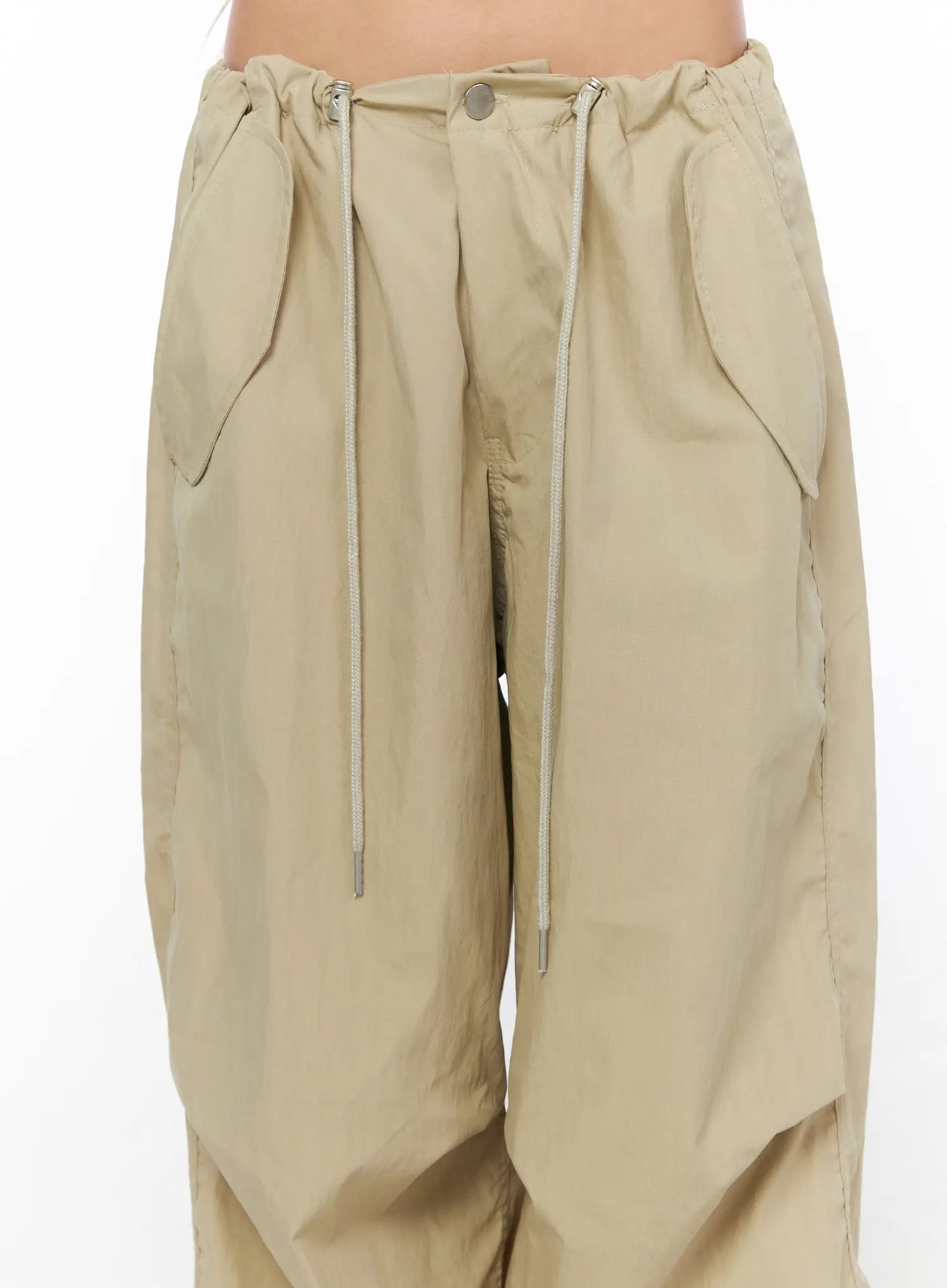 Pintuck Pocket Parachute Pants CU524 Beige close-up detail shot of waistband showing drawstring cords silver aglets button closure and pintuck pleating