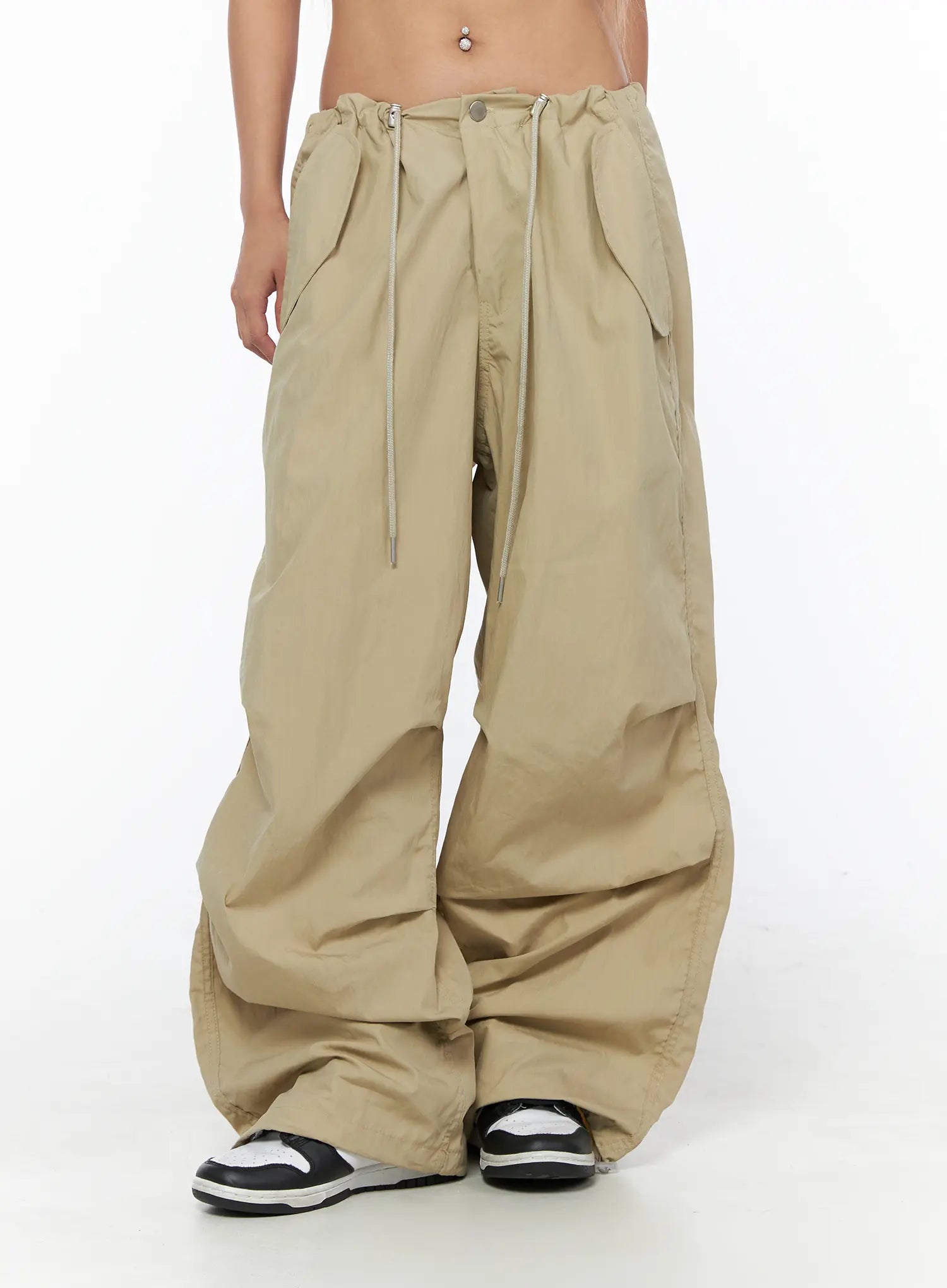 Pintuck Pocket Parachute Pants CU524 Beige front mid-body shot on model showing full waistband drawstring pockets wide balloon leg and gathered hem