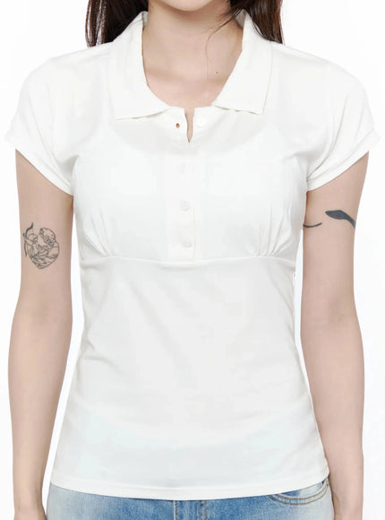 Pintuck Short Sleeve Collar Top IL502 White close-up front detail showing collar button placket and empire pintuck waist seam on model