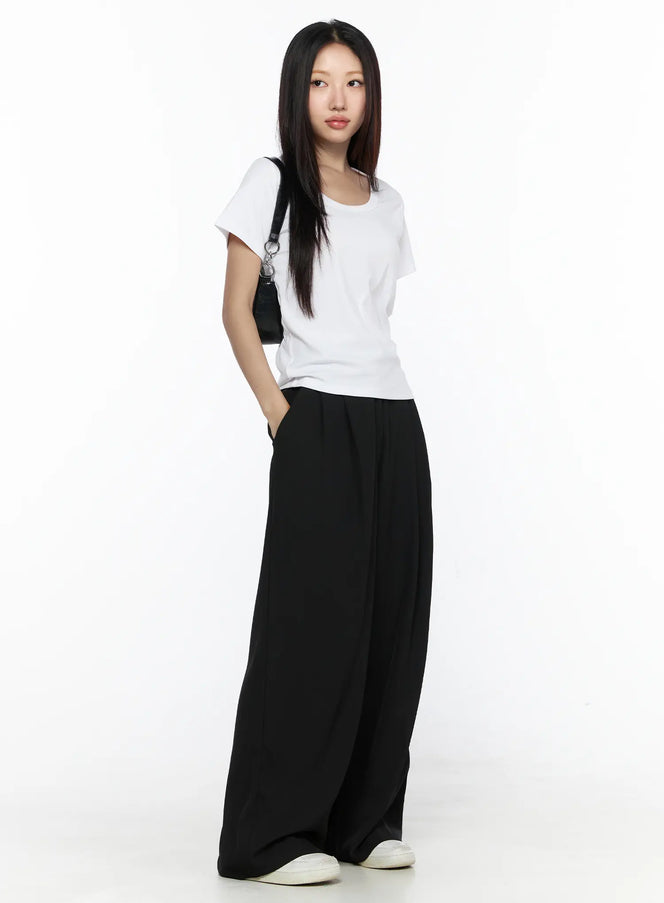 LEWKIN Pintuck Wide Leg Pants (Black) CL524 Black S full-length front diagonal shot on model styled with white tee and black shoulder bag