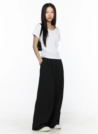 LEWKIN Pintuck Wide Leg Pants (Black) CL524 Black S full-length front diagonal shot on model styled with white tee and black shoulder bag