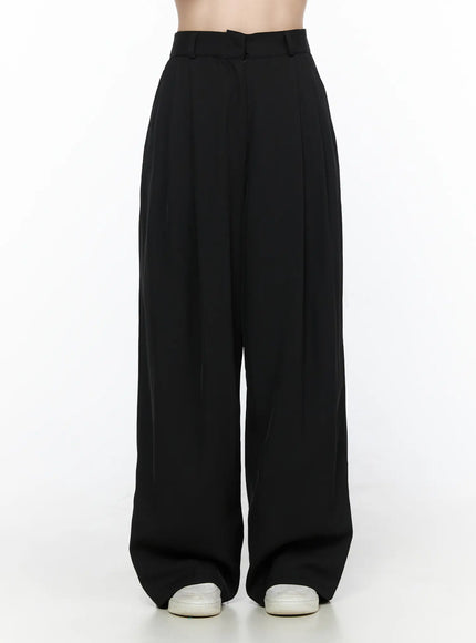 Pintuck Wide Leg Pants (Black) CL524 Black front shot on model showing high waist belt loops and deep center pintuck pleats with wide leg silhouette