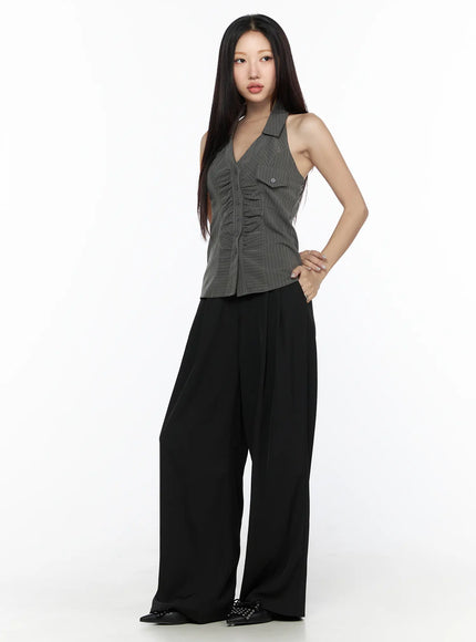 Pintuck Wide Leg Pants (Black) CL524 Black full-length front shot on model styled with grey pinstripe halter top and black studded flats hand on hip pose
