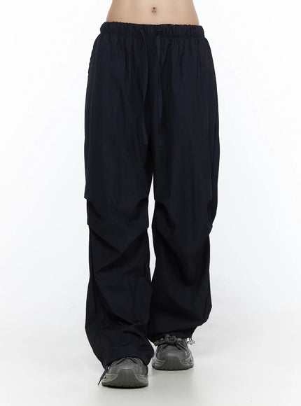 Pintuck Wide Leg Pants CL527 Dark blue front view on model showing full-length wide-leg silhouette with pintuck panel seams and elastic drawstring waist