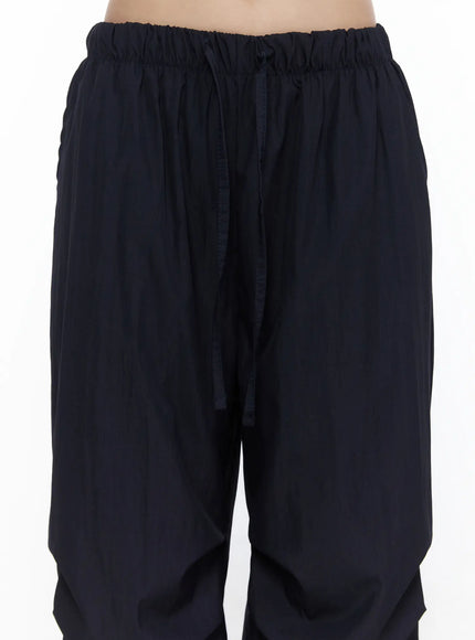 Pintuck Wide Leg Pants CL527 Dark blue close-up detail of elastic drawstring waistband and lightweight crinkle fabric texture, front detail shot