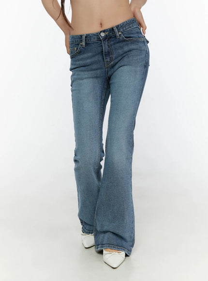 Pip Pocket Flare Jeans CL508 blue front cropped shot on model showing low-rise waistband silver button fly front pockets and flare leg opening