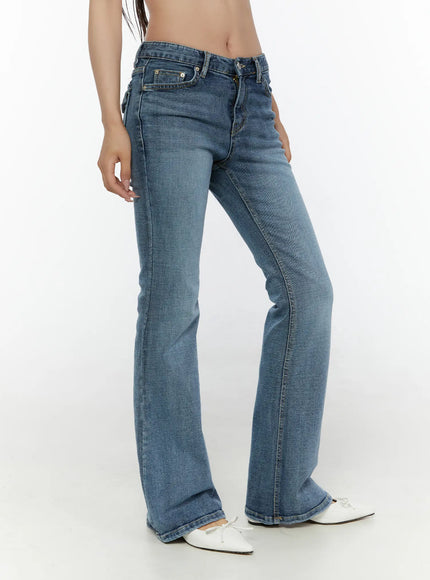 Pip Pocket Flare Jeans CL508 blue side shot on model showing low-rise waistband flare leg silhouette and front pocket detail with white mules