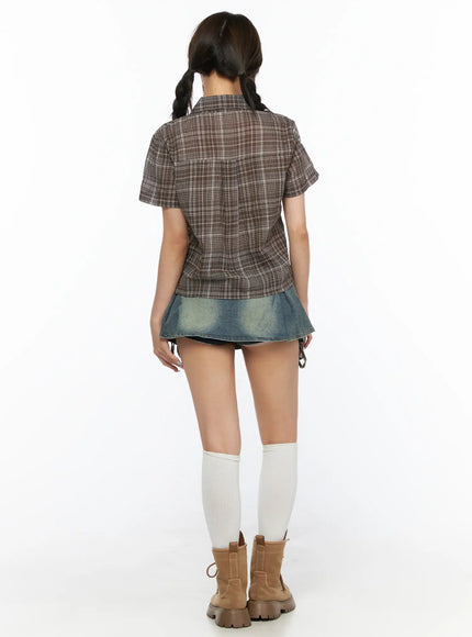 Plaid Crop Short Sleeve Shirt CL514 Brown full-body back shot on model showing collar seam and cropped silhouette with denim mini skirt white knee socks and combat boots