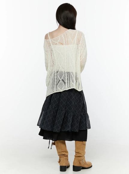 Plaid Layered Midi Skirt IL522 Black full-length back shot on model styled with cream open-knit sweater showing sheer diagonal plaid tiered skirt black underlayer tan knee-high boots