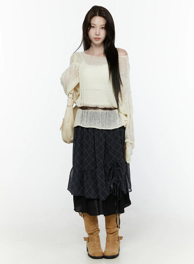 Plaid Layered Midi Skirt IL522 Black full-length front shot on model styled with cream open-knit sweater brown belt shoulder bag tan knee-high boots standing pose