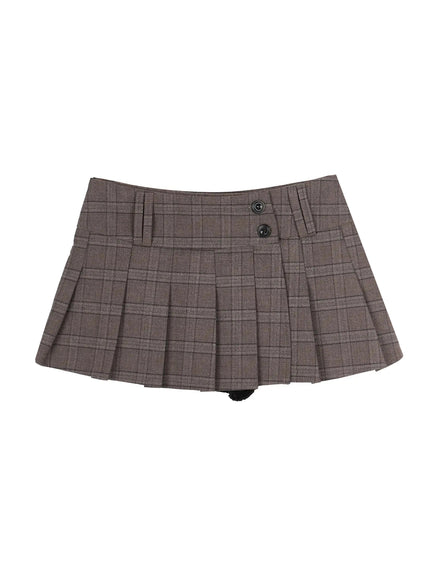 Plaid Pleated Mini Skirt IL506 Brown flat-lay front shot showing full skirt shape dual black buttons asymmetric overlap plaid woven fabric and box pleats on white background
