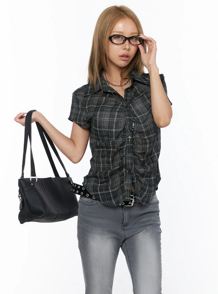 LEWKIN Plaid Shirred Blouse CU524 Black front model shot with glasses holding black bag styled with gray jeans and studded belt