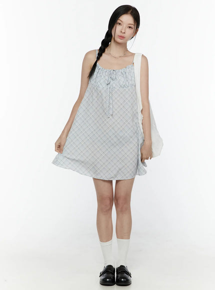 LEWKIN Plaid Shirred Cami Mini Dress IL506 Light blue front full-body model shot styled with white tote bag and black loafers size S/M