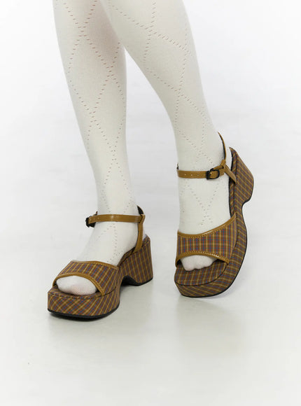 LEWKIN Plaid Slingback Platform Heels CL523 Brown close-up on model wearing white tights, angled three-quarter view showing plaid fabric and ankle strap buckle