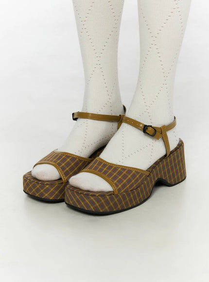 Plaid Slingback Platform Heels CL523 Brown close-up side shot on model wearing white tights, highlighting chunky platform sole and plaid textile upper
