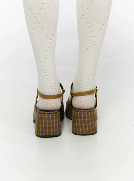 Plaid Slingback Platform Heels CL523 Brown close-up back shot on model wearing white tights, showing slingback strap closure and plaid heel counter