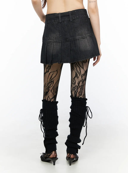 Pleated Mini Skirt And Belt Set CL522 Black back view on model showing dual patch pockets, faded washed denim texture, and pleated raw hem edge