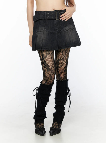 LEWKIN Pleated Mini Skirt And Belt Set CL522 Black front close-up on model waist with metal buckle belt, washed denim pleated hem, lace tights, M