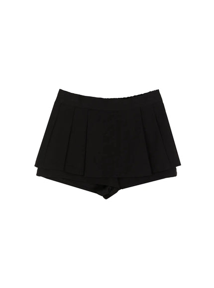Pleated Mini Skirt IL523 Black flat-lay front view showing box pleats, wide waistband, and layered inner shorts on white background