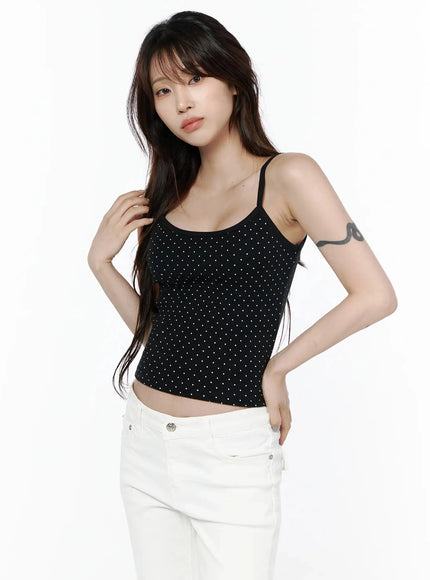 Polka Dot Cami Tank Top IL506 Black cropped front shot on model with scoop neckline, white dot pattern, spaghetti straps, paired with white jeans