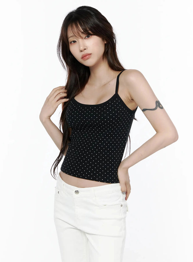 Polka Dot Cami Tank Top IL506 Black cropped front shot on model with scoop neckline, white dot pattern, spaghetti straps, paired with white jeans