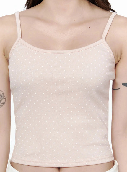 Polka Dot Cami Tank Top IL506 Pink close-up detail shot on model showing scoop neckline, white polka dot ribbed cotton fabric, and thin strap construction