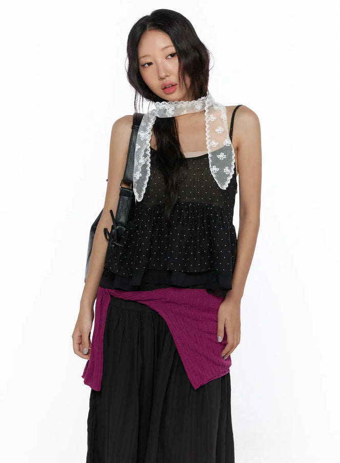 LEWKIN Polka Dot Frill Sleeveless Top CL510 Black S/M front crop shot on model styled with white lace scarf, black crossbody bag, and magenta skirt