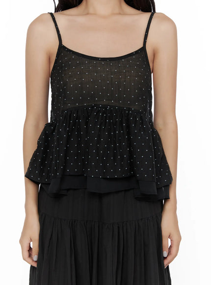 Polka Dot Frill Sleeveless Top CL510 Black front torso close-up on model without accessories showing ruffle tiers and sheer dot texture