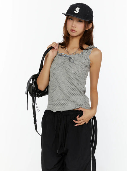 LEWKIN Polka Dot Frill Tank Top CL515 Gray front model shot styled with black track pants and cap, carrying black bag, S/M