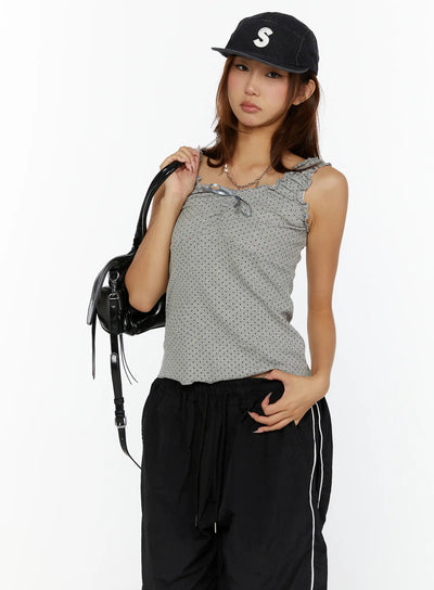 LEWKIN Polka Dot Frill Tank Top CL515 Gray front model shot styled with black track pants and cap, carrying black bag, S/M